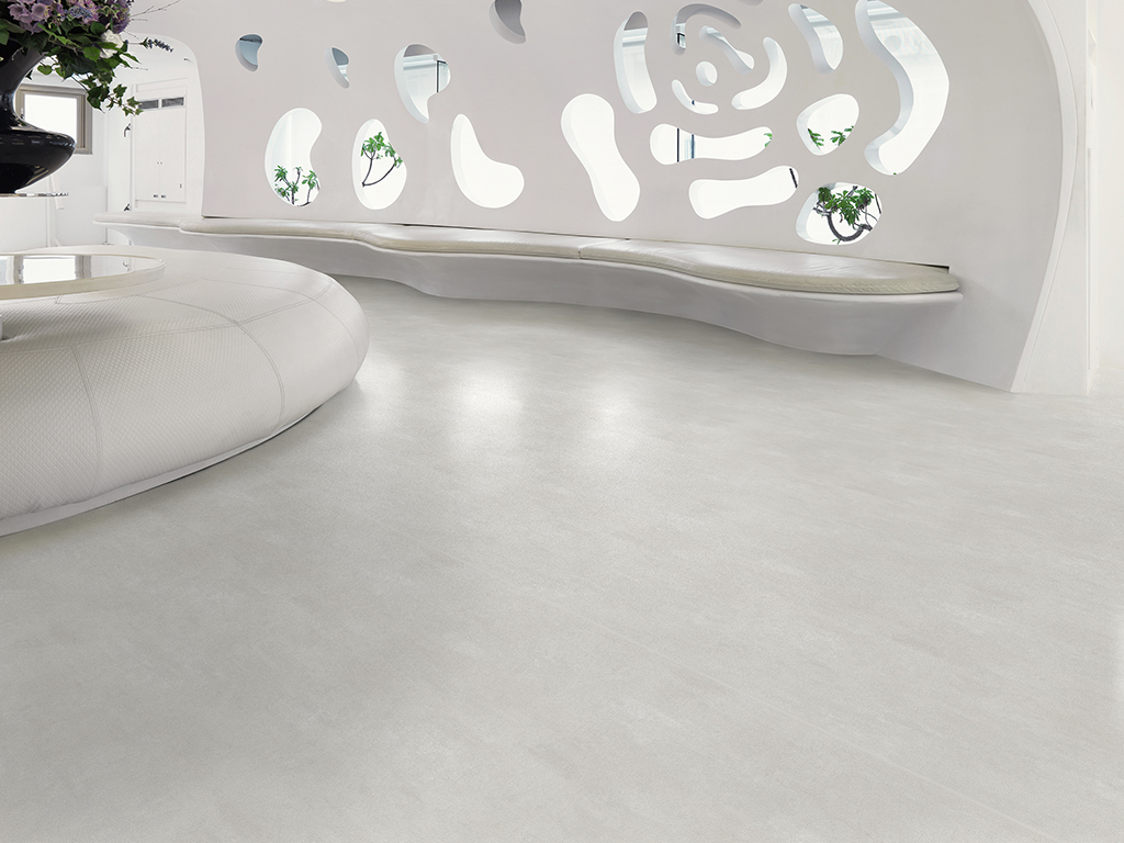 Monochromatic white lobby with cutouts in wall
