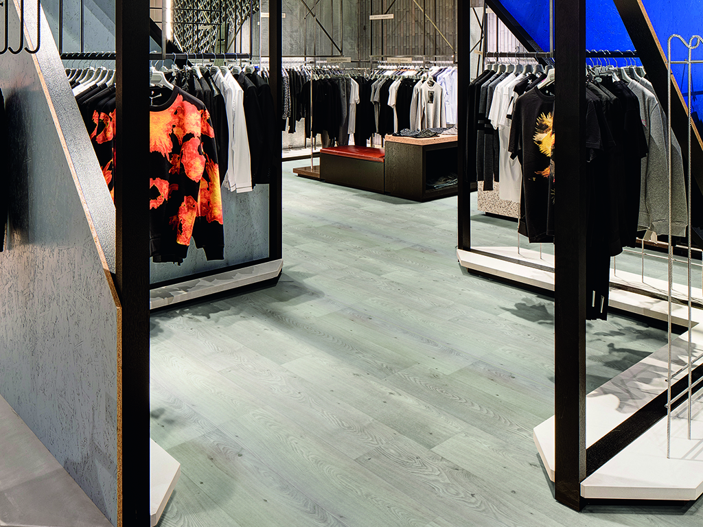 Men's wear area. Harvey Nichols Birmingham, Birmingham, United Kingdom. Architect: Virgile and Partners, 2015.