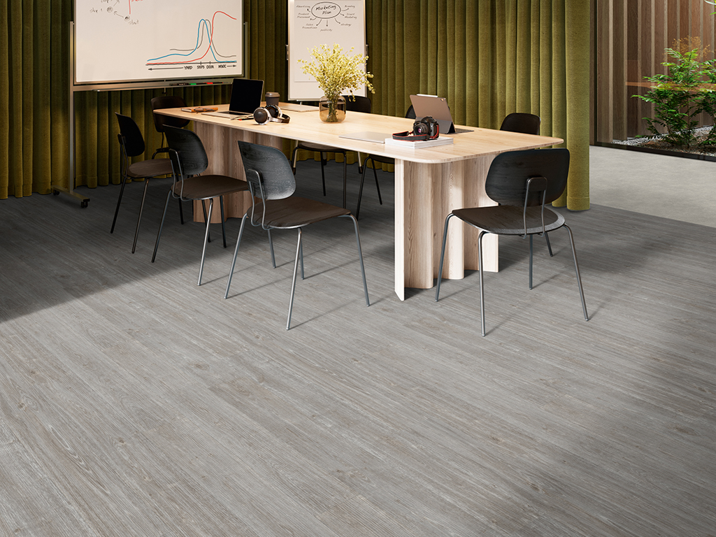 3d render of modern meeting room interior. Digitally generated image of a creative office conference room with green curtains, whiteboard, flipchart wooden table and chairs.