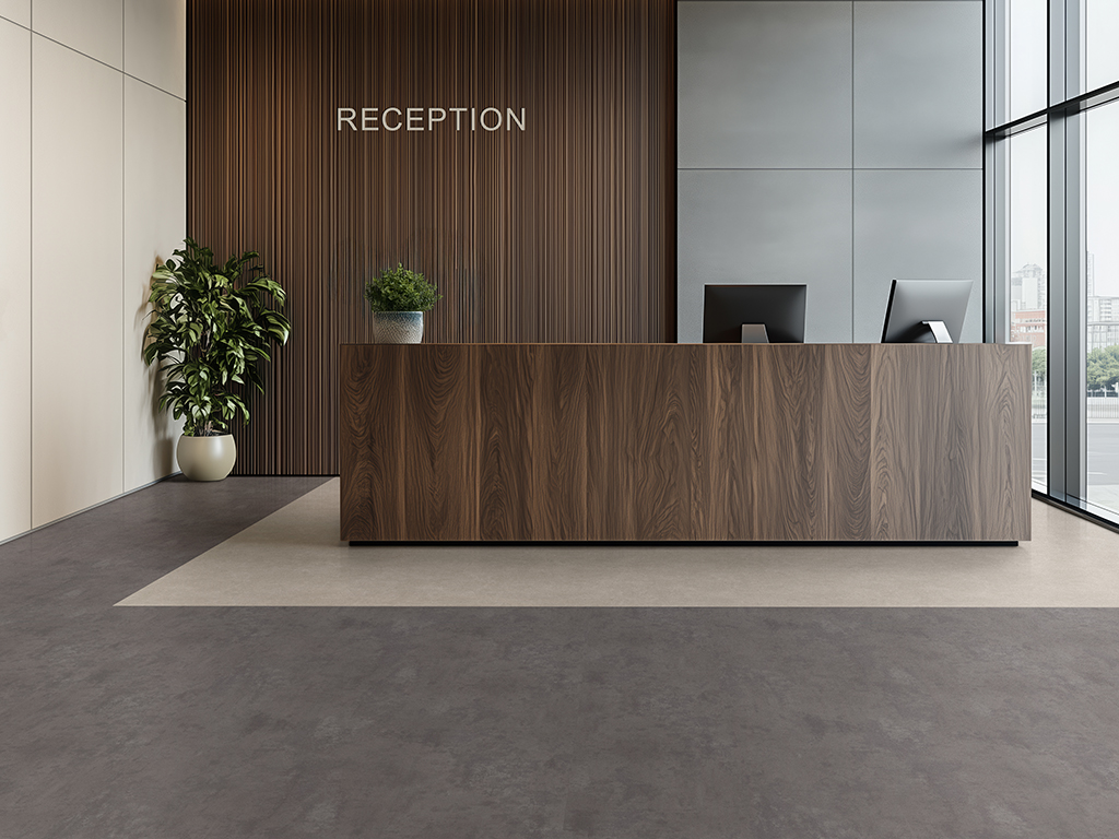 Create a wabi-sabi-inspired reception area for a commercial office, featuring dark walnut wood furniture and grey stone flooring. The reception desk is minimalistic, with a small green plant and a few